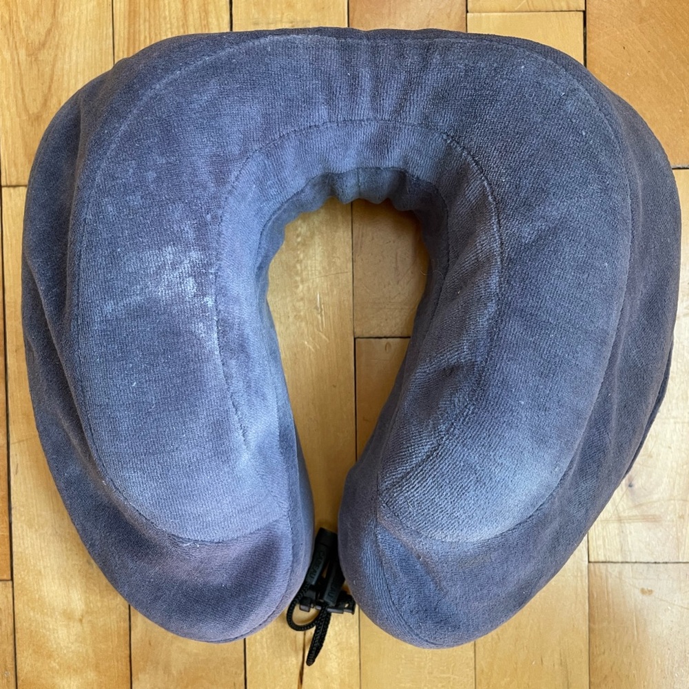 Cabeau gray neck pillow.